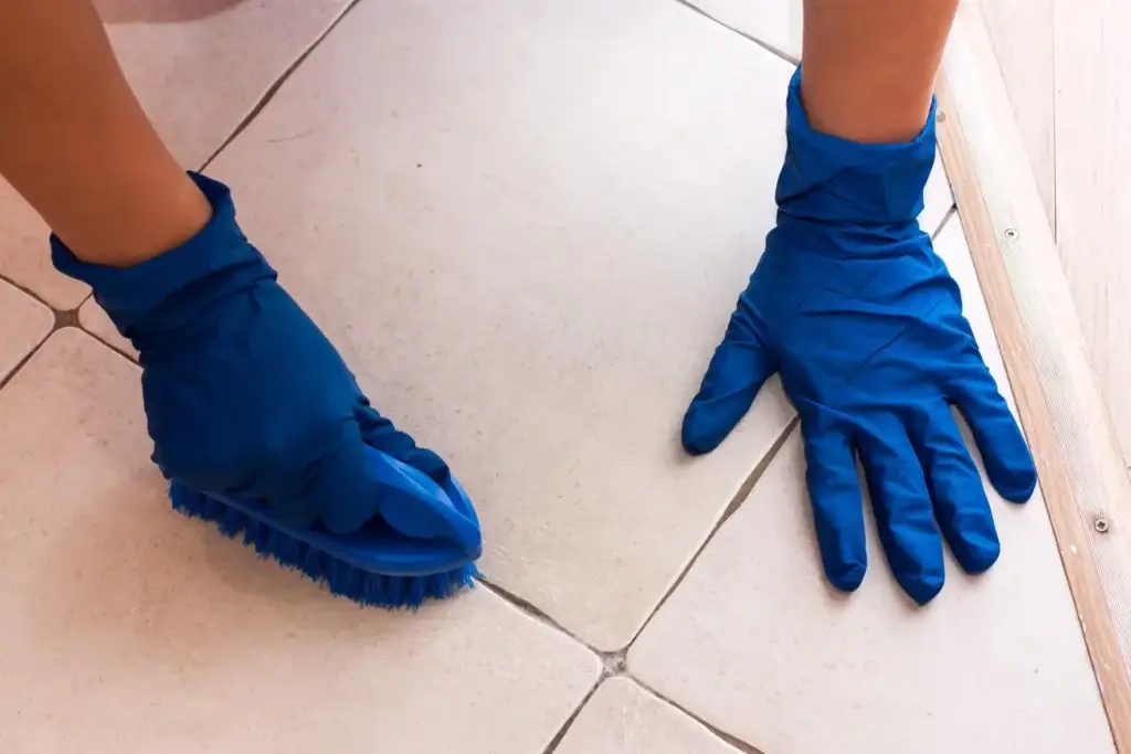 how to clean grout between tiles